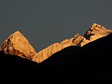 25 Nyanang Ri, Pungpa Ri and Shishapangma At Sunrise From Nyalam Nyanang Ri (7071m), Pungpa Ri (7445m) and Shishapangma (8012m) shine at sunrise from the Shisha Bangma Hotel in Nyalam.
